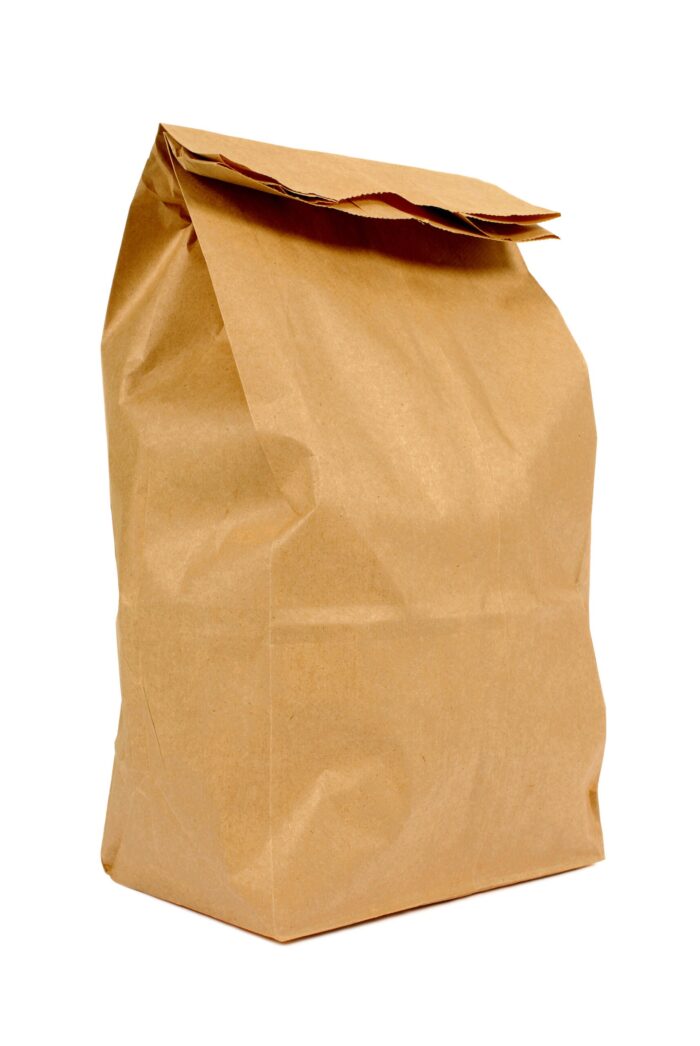 Brown paper bag isolated on white background